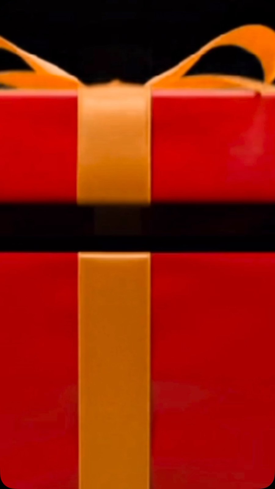 A wrapped red gift featured in the school's holiday reel